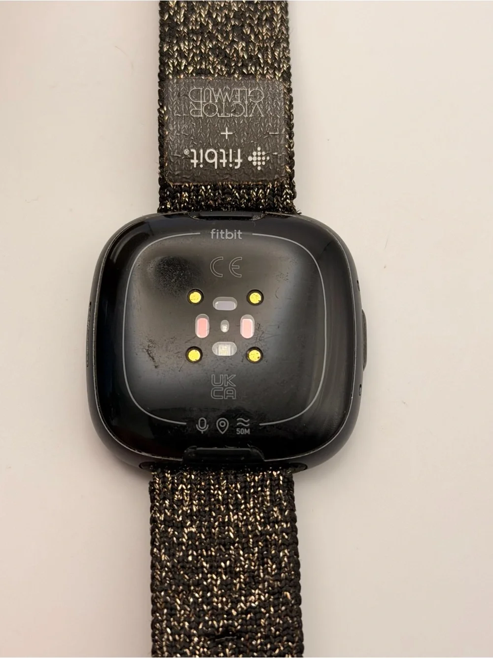 Fitbit Versa 4, Charger Included, Tested, Black & Gold Sparkle Band, very Good
